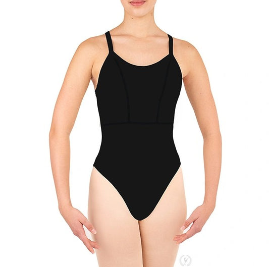 Dancer is wearing a black, wide strap, camisole leotard with princess seams and back straps that cross. Dancer has paired the garment with pink tights and has her arms in a low first position.