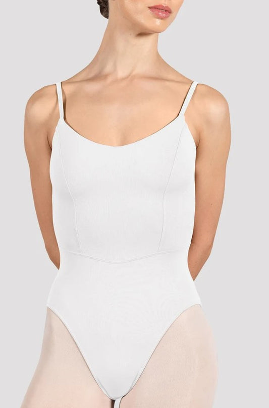 Dancer is wearing a white, camisole leotard with a scoop neck and back and bodice seam detail. 