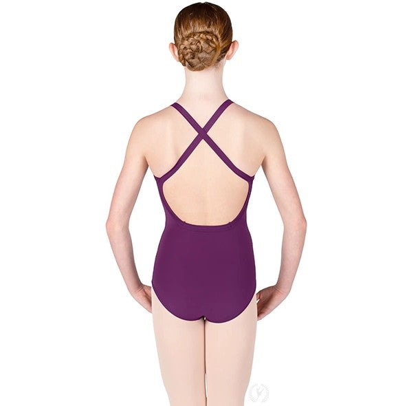 Dancer is wearing an eggplant, wide strap, camisole leotard with princess seams and back straps that cross. She is also wearing pink tights and is showing a back angle of the garment.