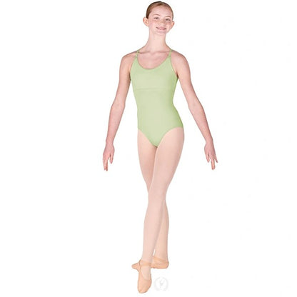 Dancer is wearing a multi-wear, adjustable, camisole leotard with a keyhole back in seafoam. She has paired the garment with pink tights and ballet shoes and is standing with her left foot pointed forward.