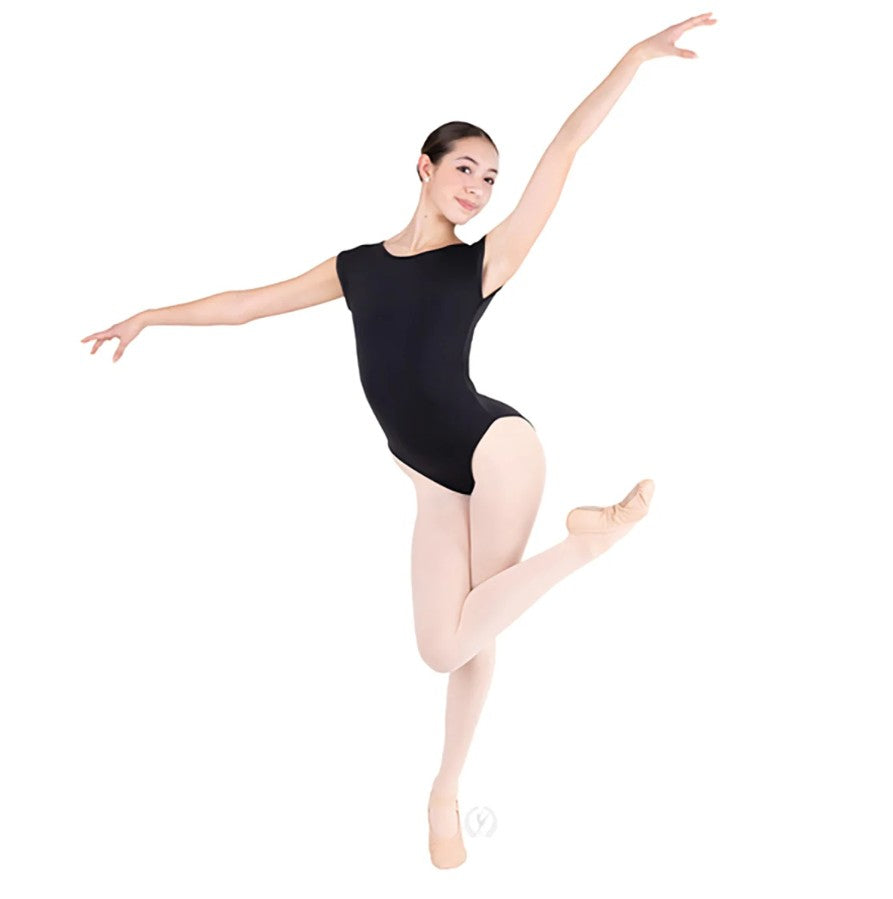 Dancer is wearing a black, boatneck, cap sleeve leotard with an open mid back and elasticized button closure. She has paired the garment with pink tights and ballet shoes and is standing with her right leg crossed over her left.