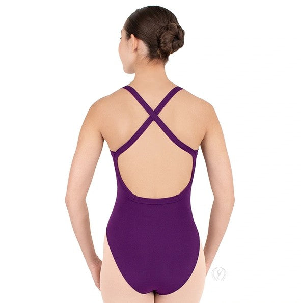 Dancer is showing a back angle of an eggplant, wide strap, camisole leotard with princess seams, empire waist and a low, squared off back with criss- cross straps.