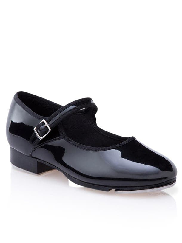 A Mary Jane style, black, synthetic patent leather tap shoe. Features include,  foam cushioned insole, wide velcro buckle strap, and non slip heel counter. 
